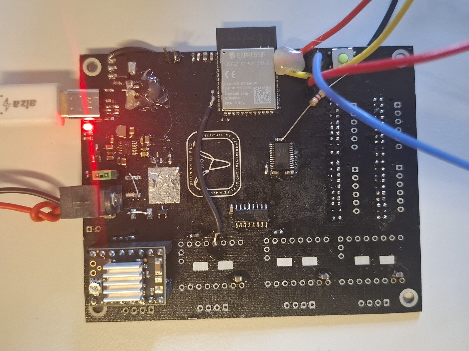 Photo of the prototype with component clusters soldered and bypass wires visible